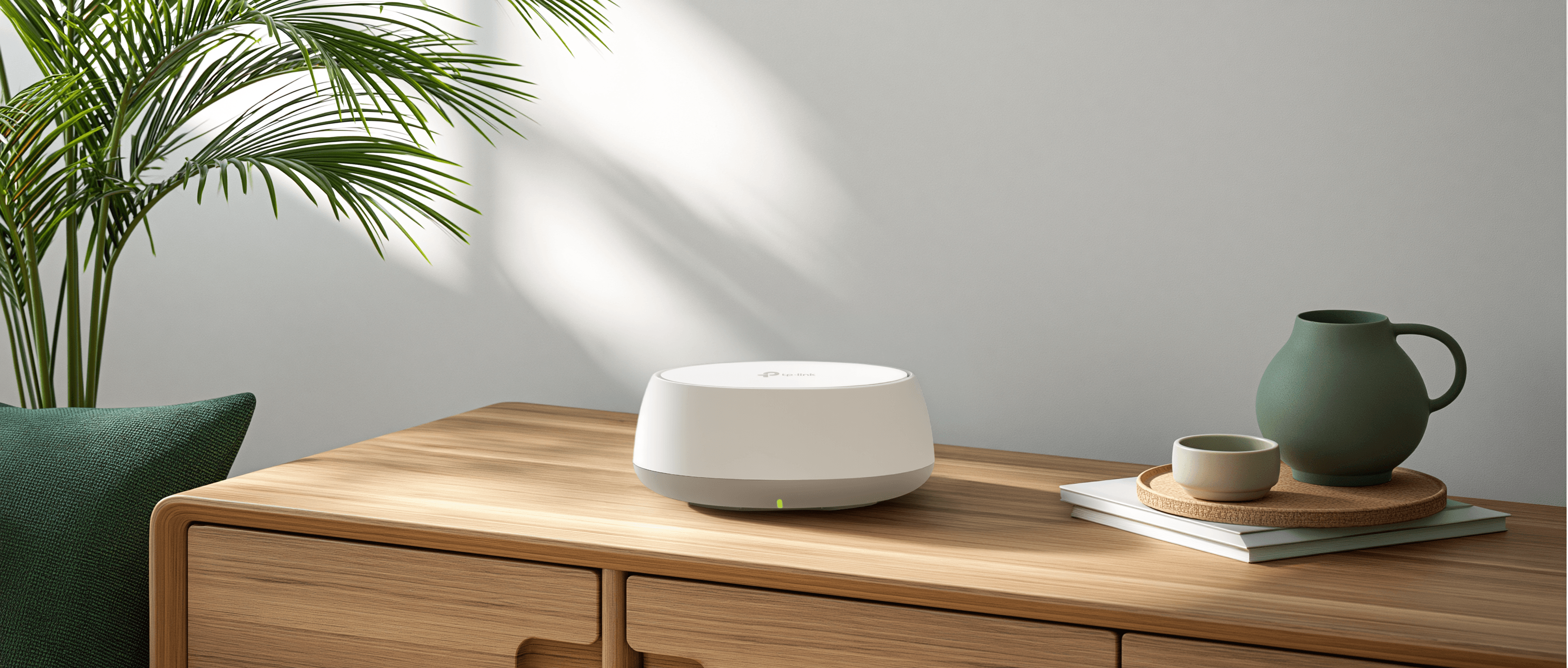 TP-Link HB210 Pro WiFi 7 modem on a desk